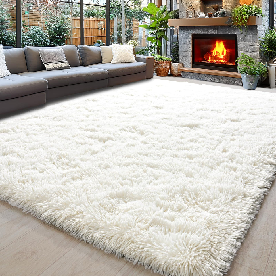 Awaytail 8x10 cream white shag rug adds soft warmth to living rooms.