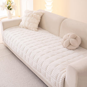 Awjcsv couch cover in white fuzzy fabric protecting a 3-cushion sofa