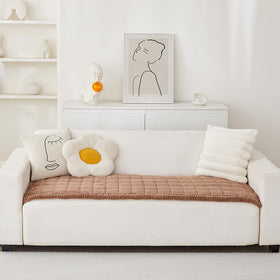 Awjcsv sofa protector with non-slip base keeps the cover in place.