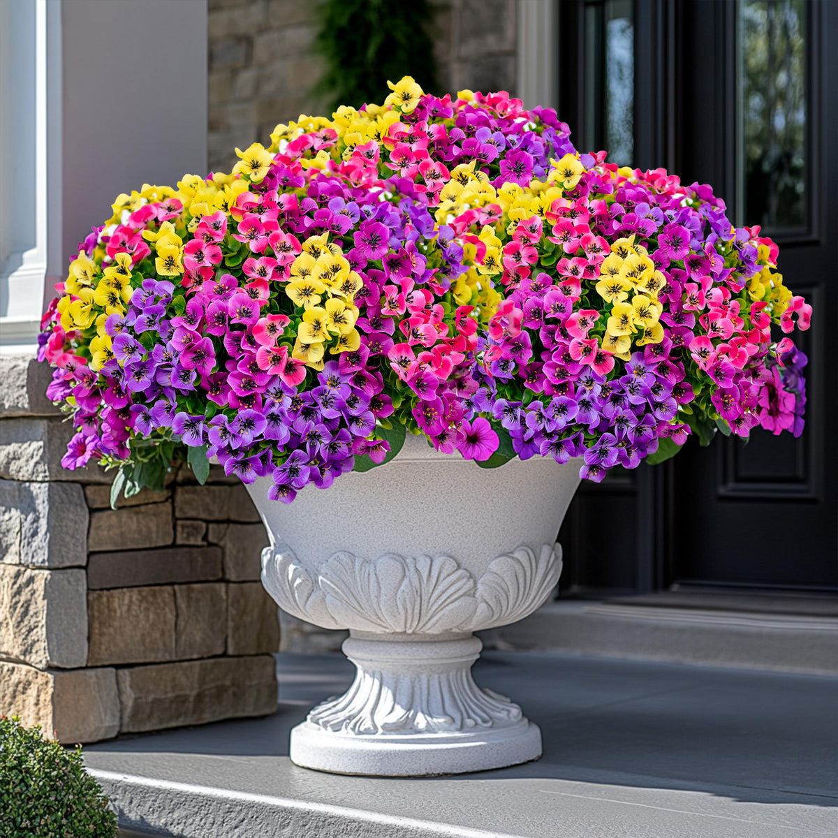 AXYLEX artificial greenery privacy screen enhances seclusion on patios and windows.
