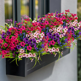 AXYLEX faux plants provide porch privacy with lush, low-maintenance greenery