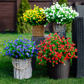 AXYLEX UV-resistant red faux plants withstand sun on outdoor spaces.