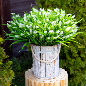 AXYLEX privacy-creating fake flowers help screen ground-floor windows.