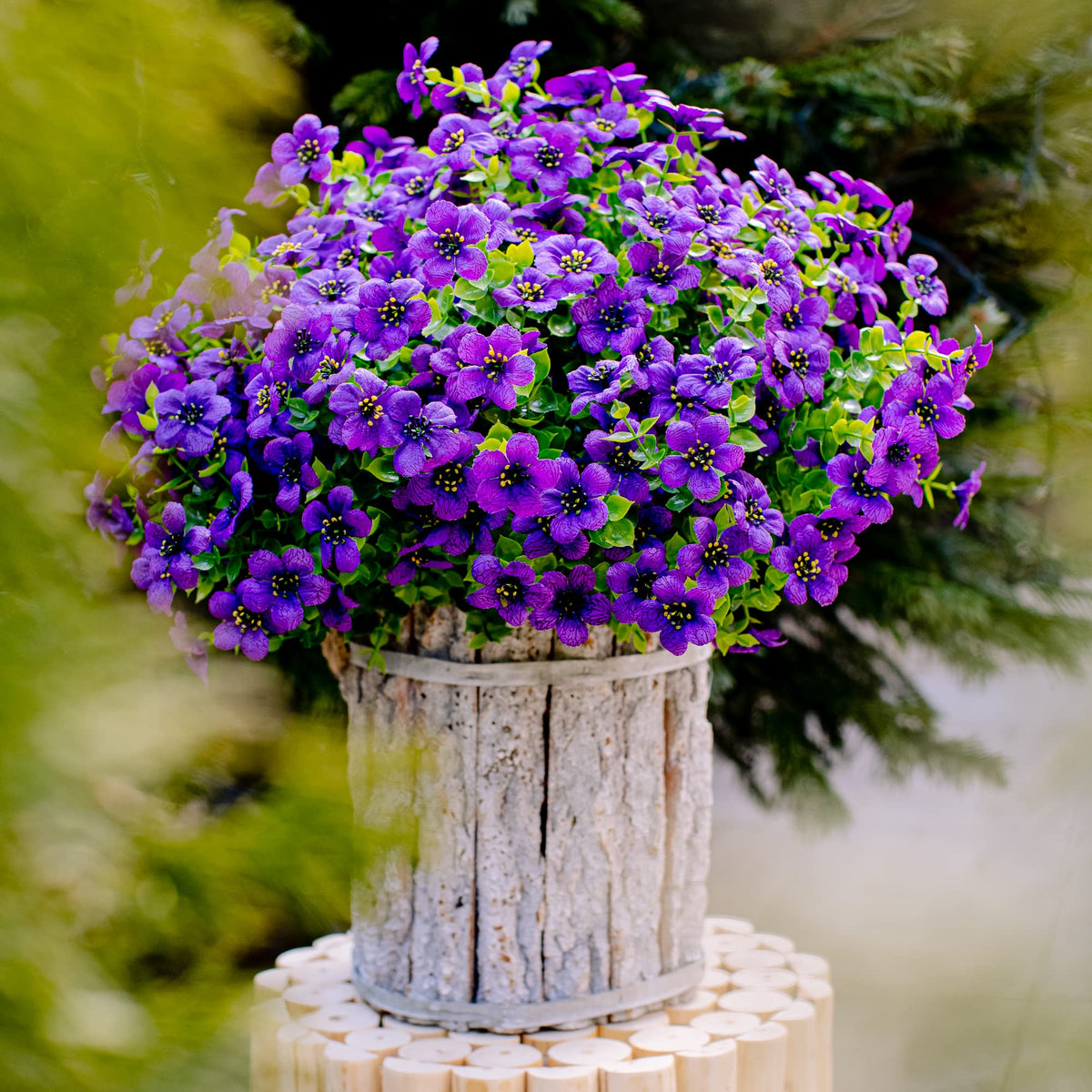 AXYLEX versatile faux plants complement patios, porches, and office spaces.