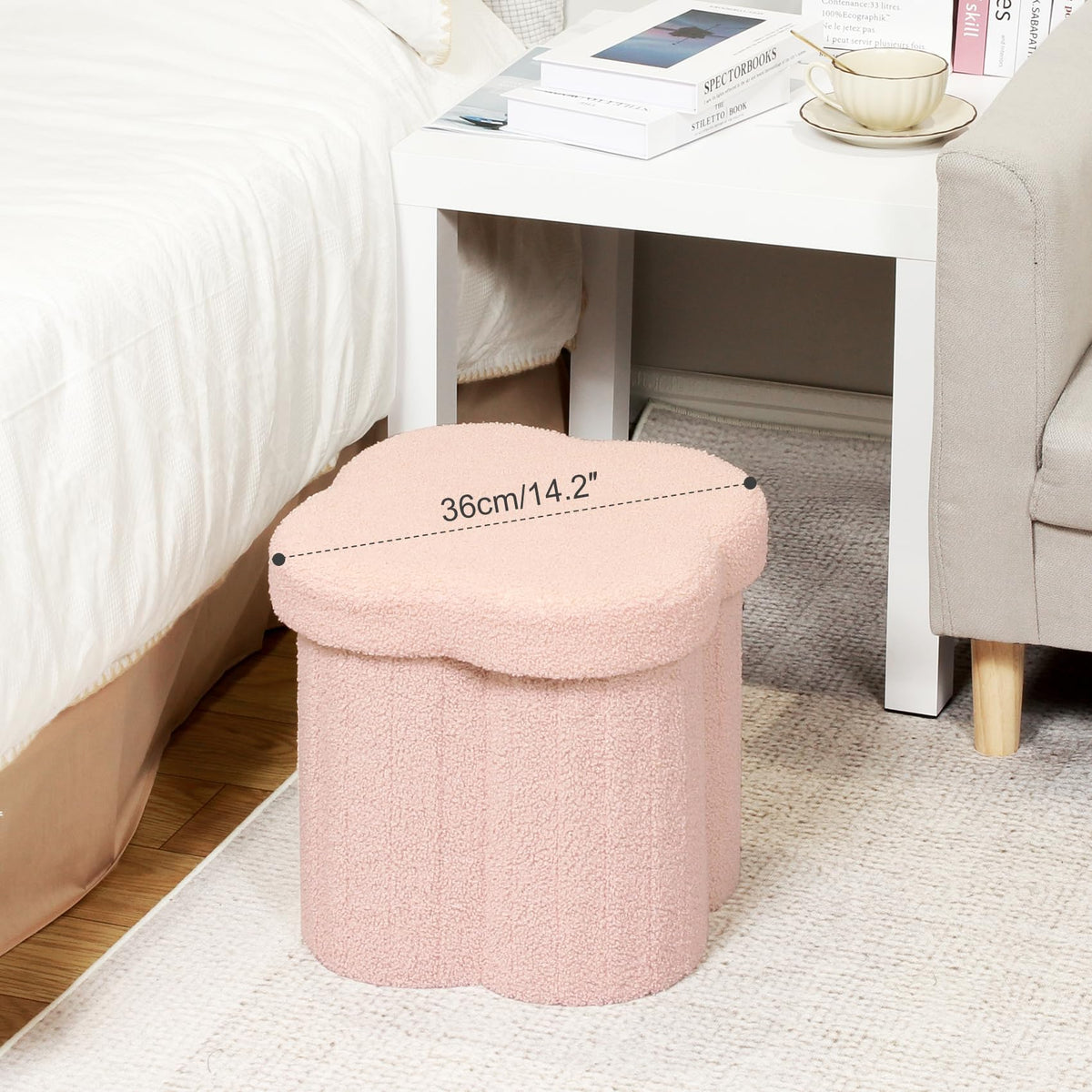 B FSOBEIIALEO ottoman interior stores blankets and toys.