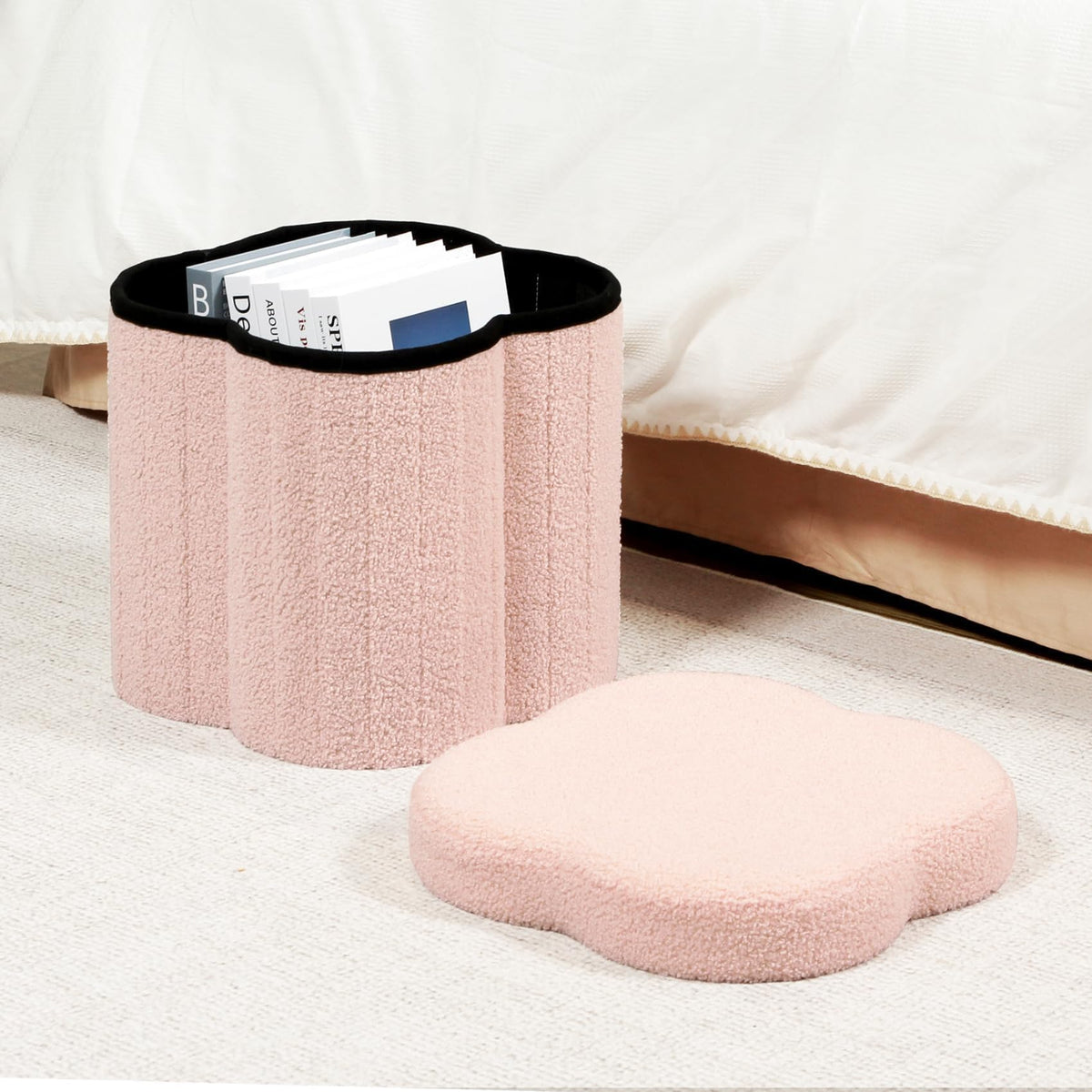 B FSOBEIIALEO pink faux teddy fur ottoman provides cozy seating.