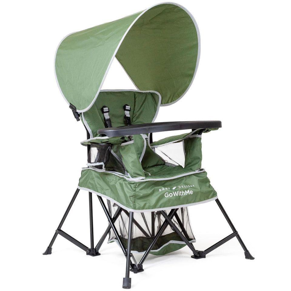 Baby Delight Go With Me Venture chair with sun canopy providing outdoor shade.