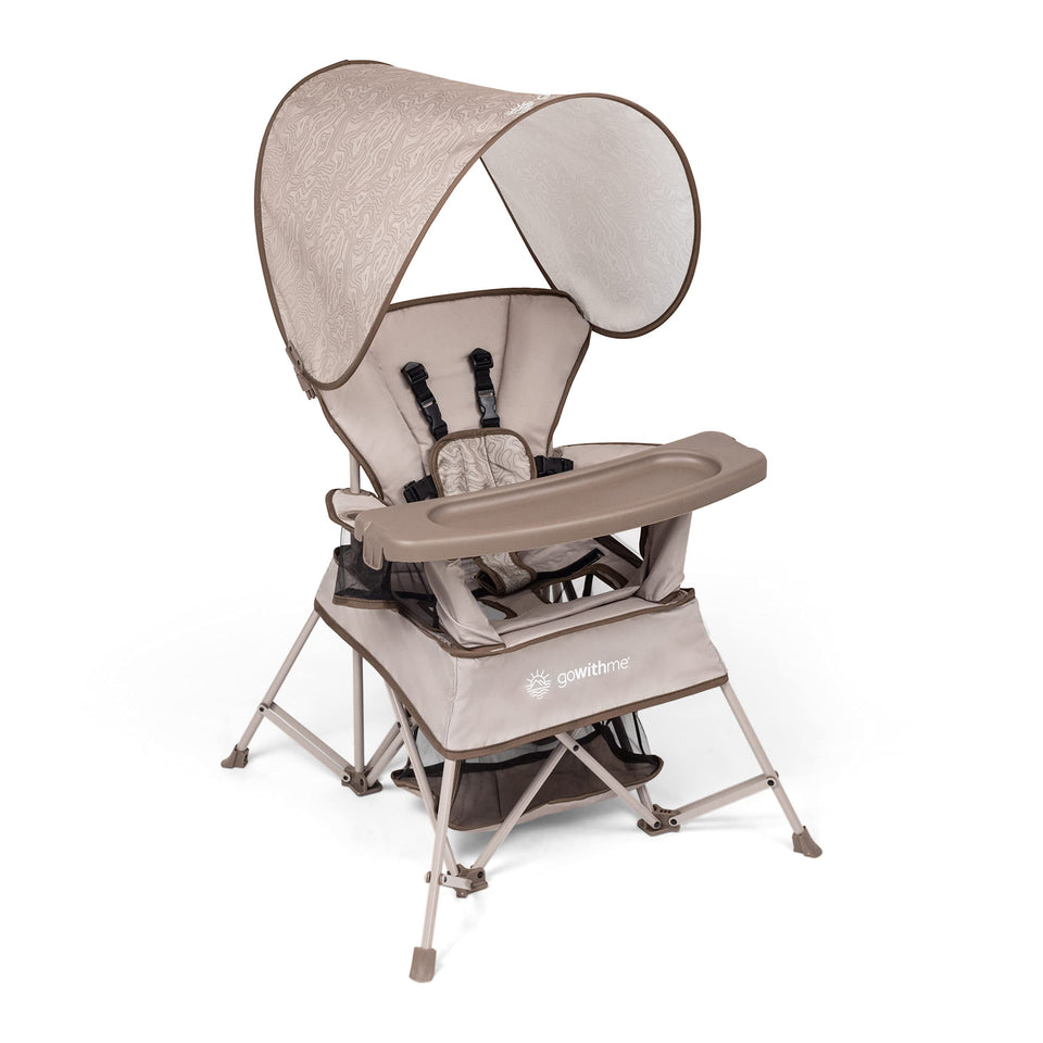 Baby Delight Go with Me Venture Chair sun canopy provides shade for outdoor adventures.