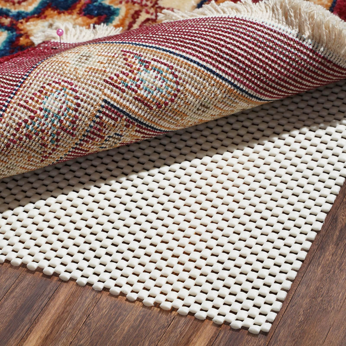 Bagail Basics non-slip rug pad on hardwood floor keeping rug in place.