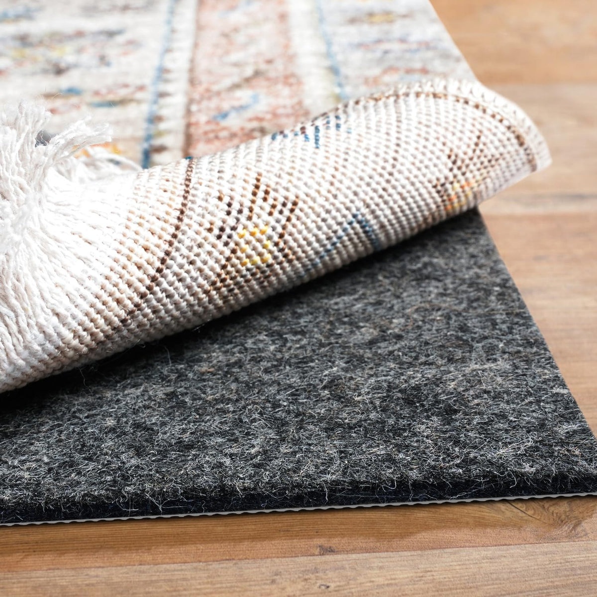 BAGAIL BASICS rug pad with cushioned 1/4-inch surface under a rug for soft comfort