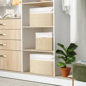 Bagnizer bin in closet helps tidy up seasonal garments and accessories.