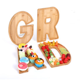 Bagrox Grad letters fillable box on a wooden display for elegant party prep.