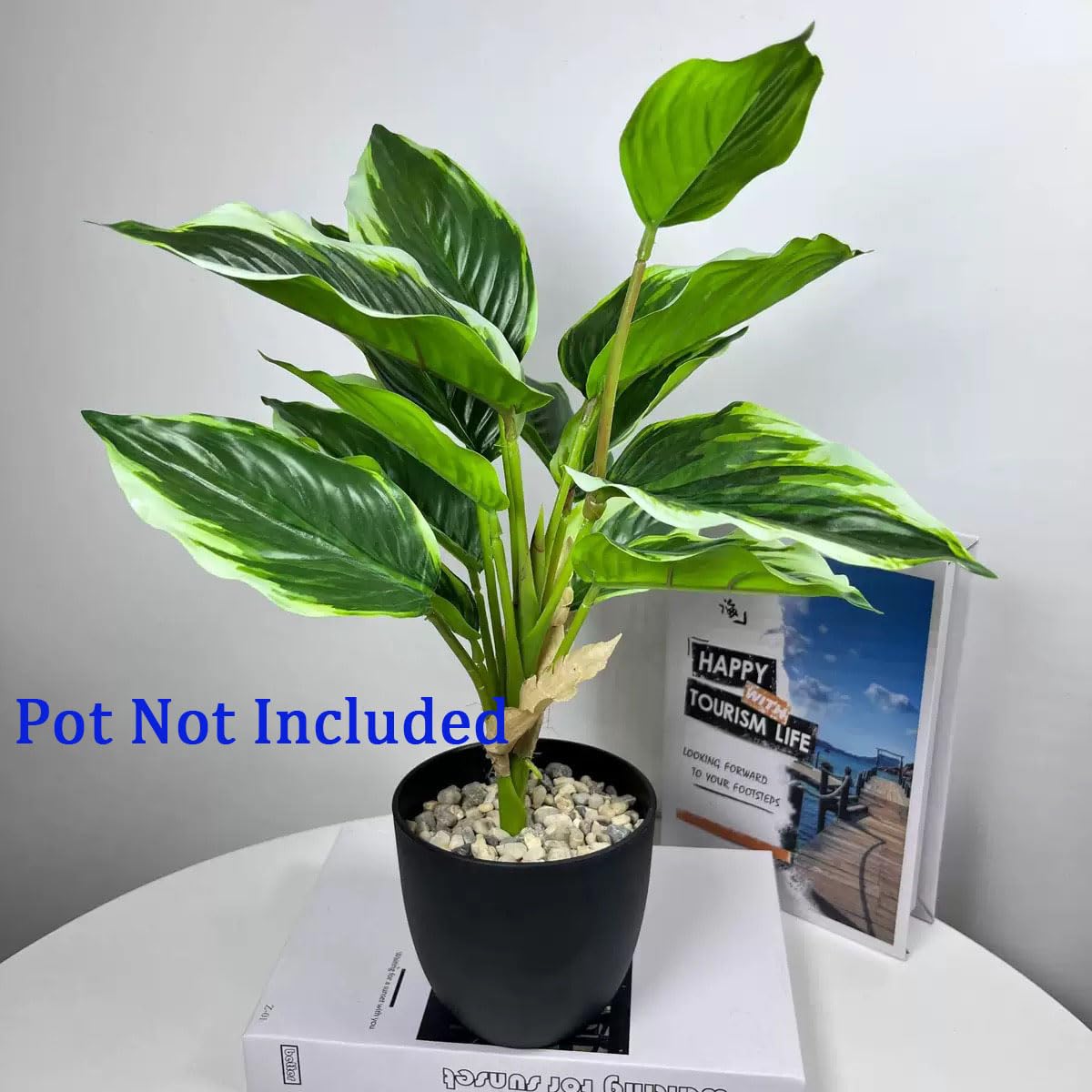 Bakoukiter faux hosta bush adds vivid greenery to patios and balconies.