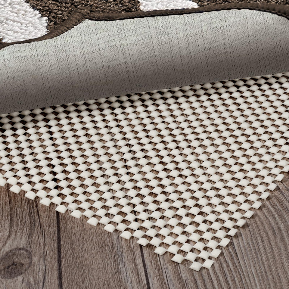 BALEINE non-slip rug pad on hardwood floor provides secure grip for high-traffic areas.