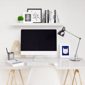 Ballucci white floating shelf complements minimal decor in modern spaces.