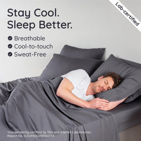 Bambaw charcoal queen sheet set laid flat, highlighting smooth finish.