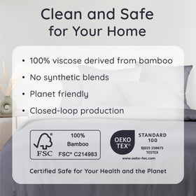 Bambaw corner straps secure the charcoal sheets on mattress.