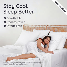 Bambaw King white fitted sheet corner straps keep sheet in place during the night.