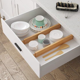 BAMEOS bamboo drawer dividers in a kitchen drawer organizing utensils