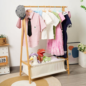 Bamnestor bamboo kids clothing rack front view highlighting sturdy build and tidy room organization.
