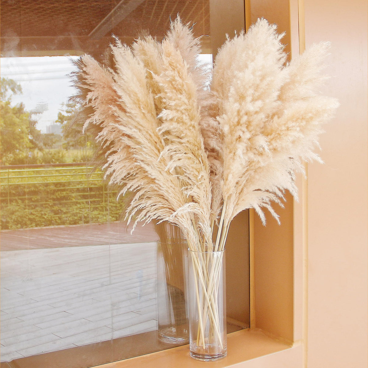 Bannifll dried pampas arrangement on dining table creates warm focal point.