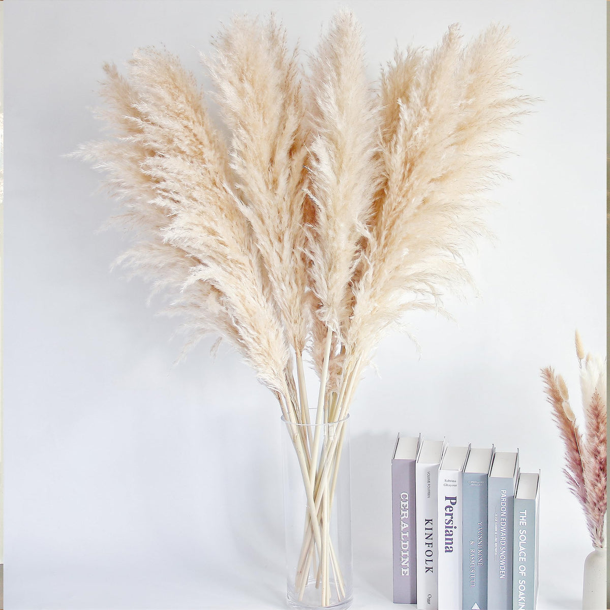 Bannifll farmhouse dining area pampas arrangement adds texture.
