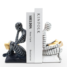 Banomii heavy-duty book ends with thinker pair keep books steady on shelves.