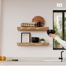 Baobab Workshop wall-mounted floating shelves with hidden hardware for clean, gap-free installation.