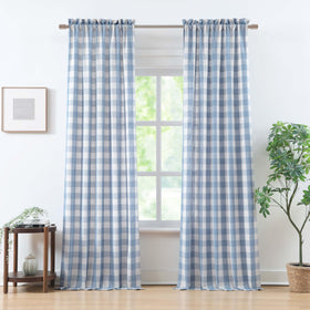 Bapawfish buffalo plaid curtain panels add cozy texture to bedroom windows.