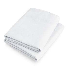 Bare Home white pillowcases add a crisp, clean look to bedding