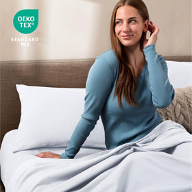 Bare Home set of 2 white pillowcases on a neatly made bed