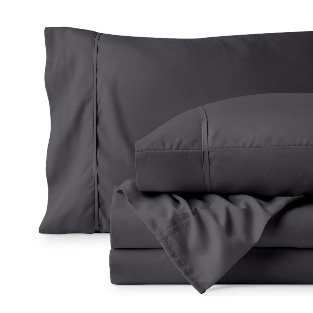 Bare Home iron-grey color swatch on bed for versatile styling.