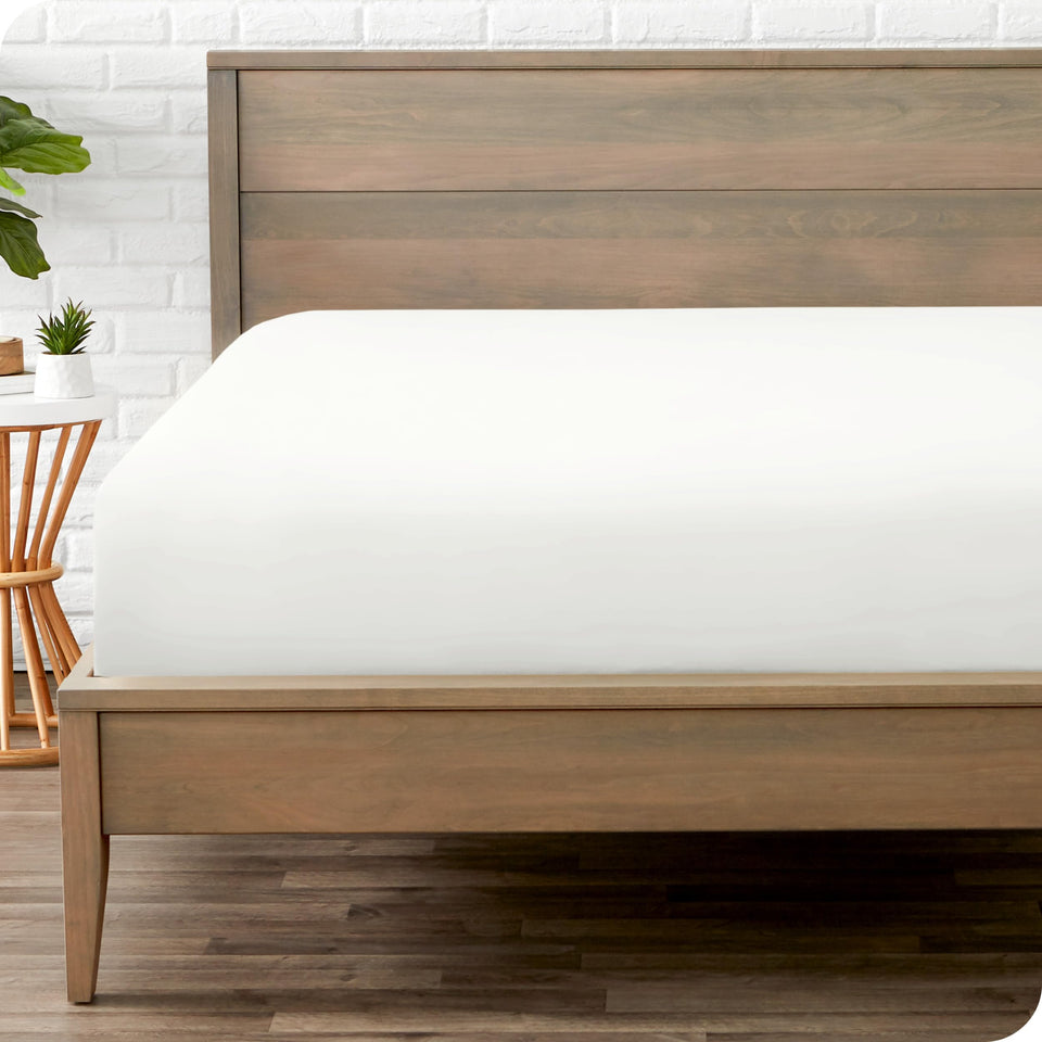 Bare Home queen fitted sheet cream on bed offers luxurious sleep comfort