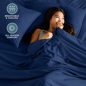 Bare Home queen flat sheet 90x102 laid on bed shows size and shape.