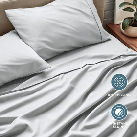 Bare Home queen sheet set easy-care label closeup for machine wash and quick-dry