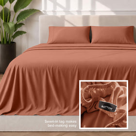 Bare Home terracotta color sheet adds warm, earthy tone to the bedroom look.