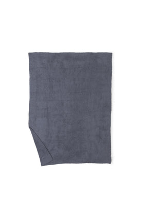 Barefoot Dreams CozyChic Throw on bed for relaxing evenings