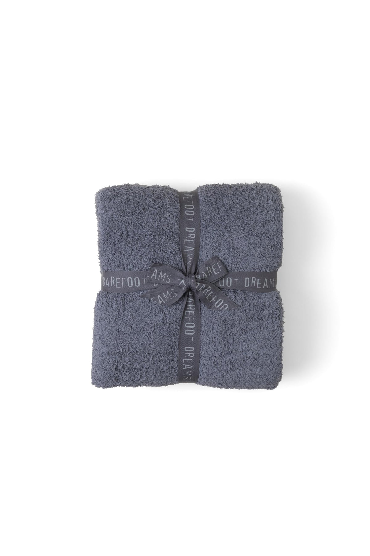 Barefoot Dreams CozyChic Throw Graphite 54x72 draped over sofa for warmth