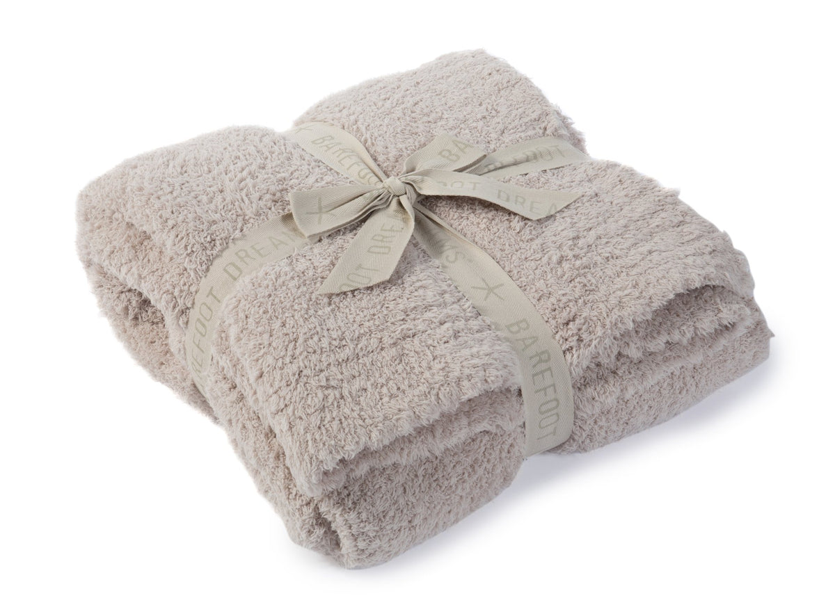 Barefoot Dreams CozyChic Throw Stone draped to showcase lightweight warmth