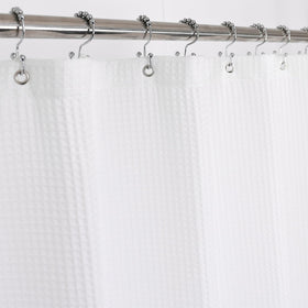 Barossa Design cotton blend shower curtain with honeycomb waffle weave adds spa-like luxury.