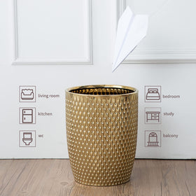 BASDHE ceramic trash bin with gold-plated finish adds luxury to any space.