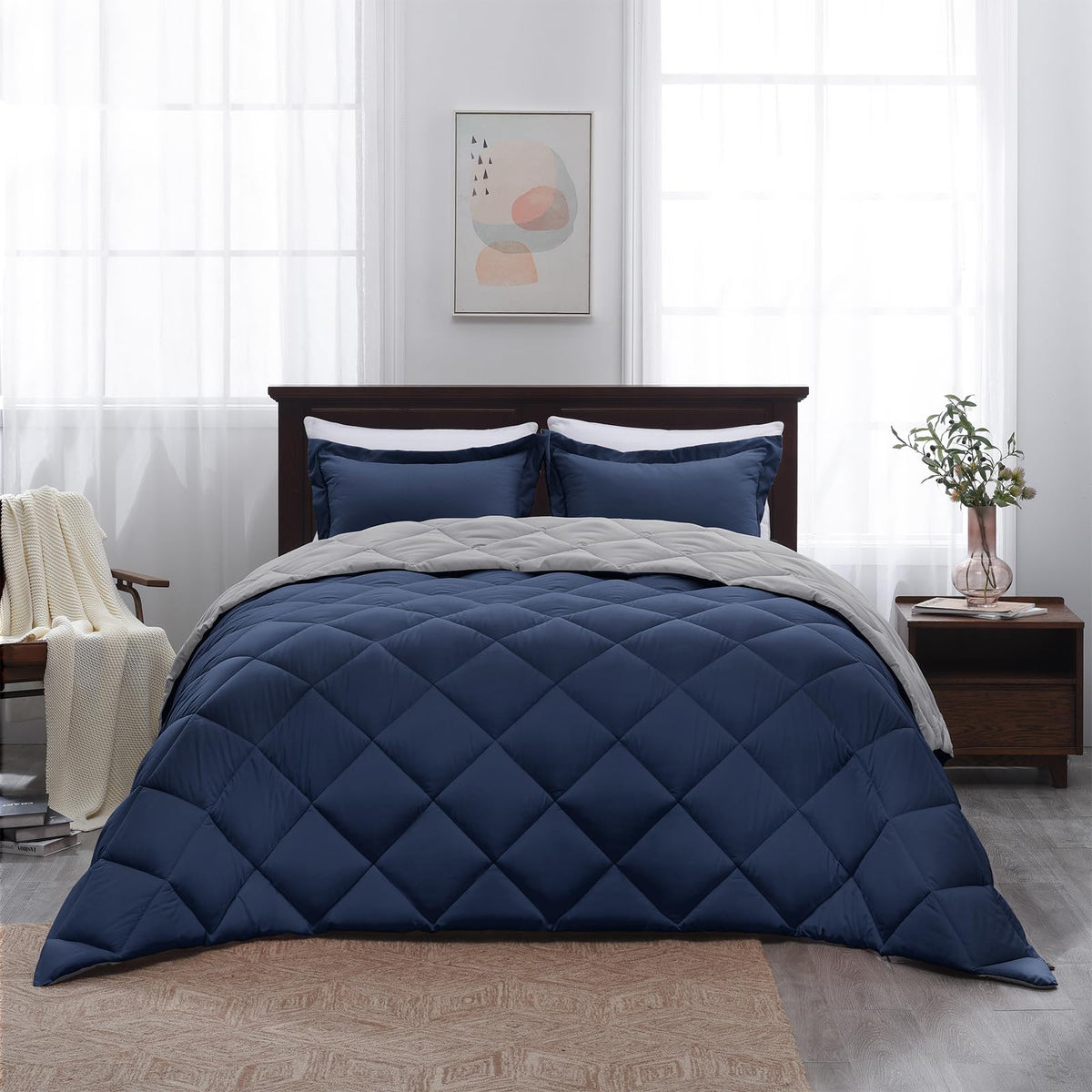 Basic Beyond coordinated navy and grey bedding in a stylish bedroom setup.