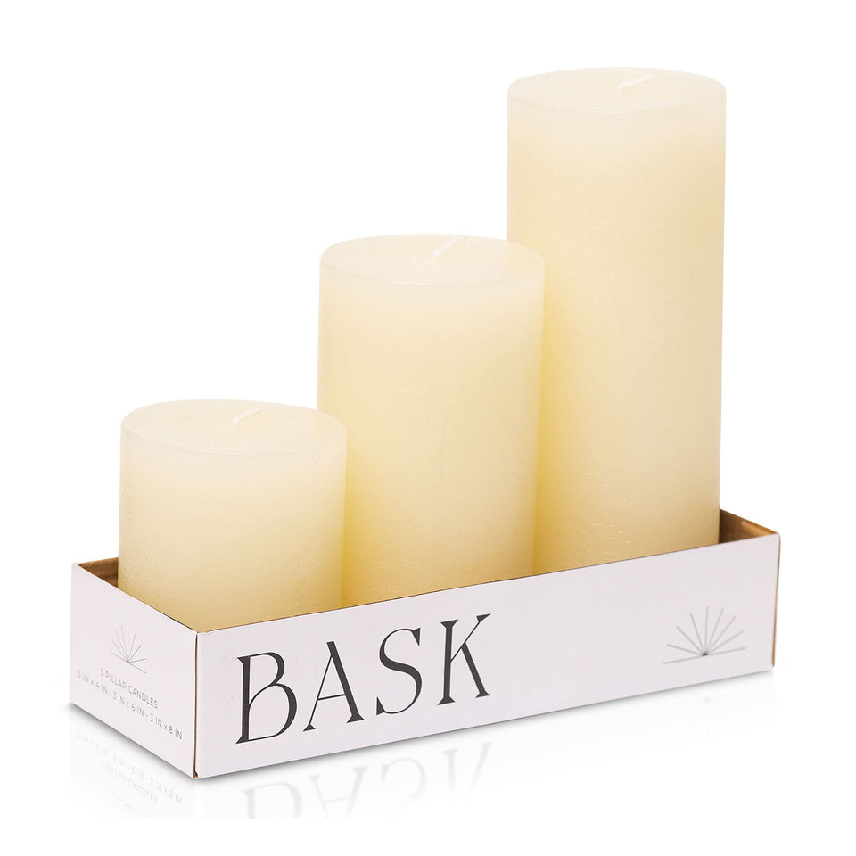 Bask Mottled Pillar Candles 3x4 Ivory for a versatile centerpiece and warm ambience.
