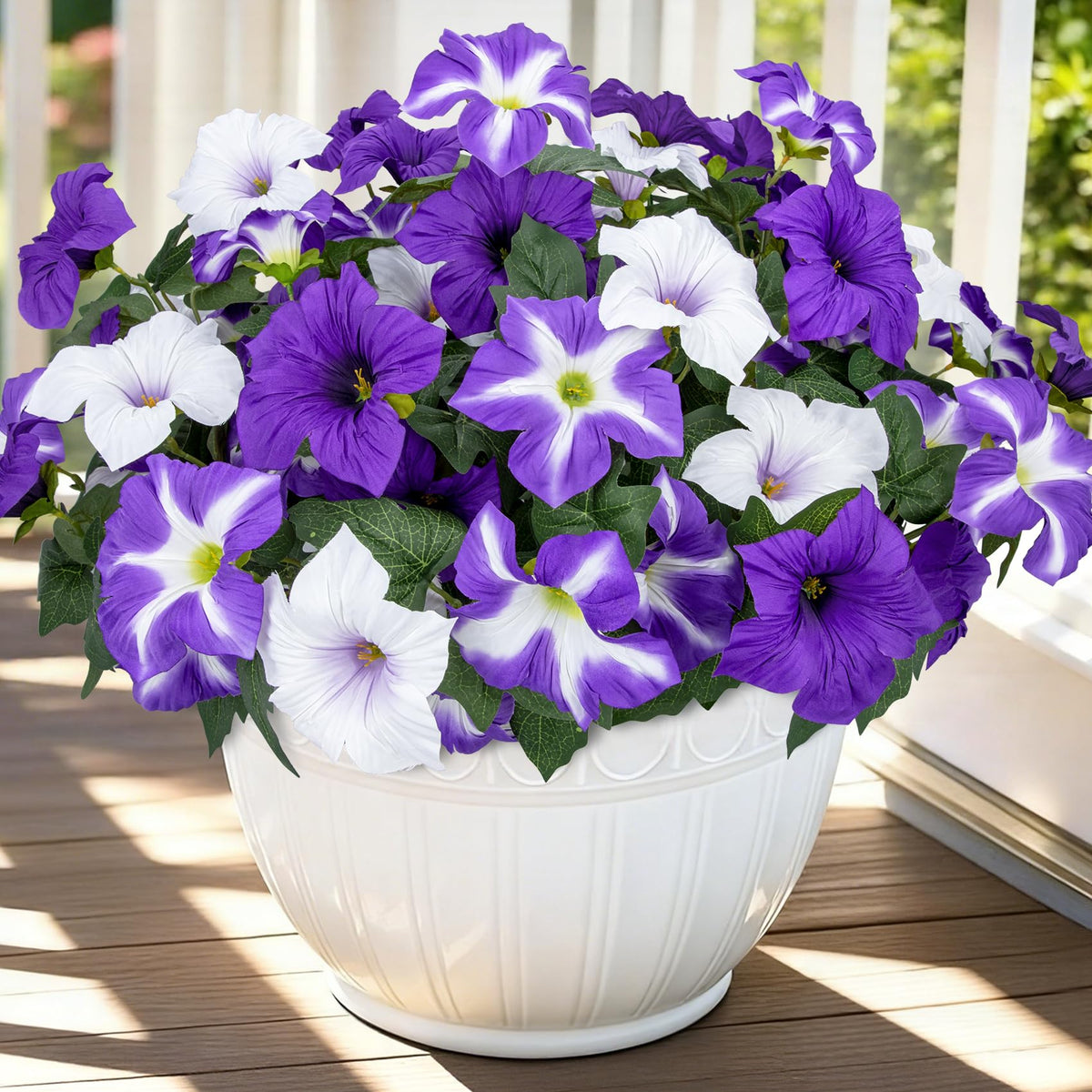 Bassion petunias faux flowers on a branch add vibrant outdoor color year-round.
