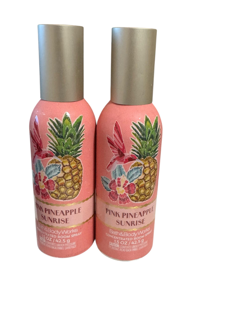 Bath & Body Works Pink Pineapple Sunrise room spray bottle for quick, refreshing ambience.