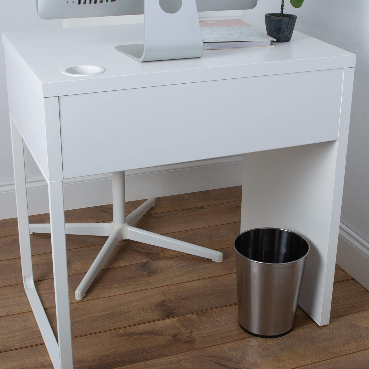 Bath Bliss durable iron wastebasket resists rust for long-lasting use.