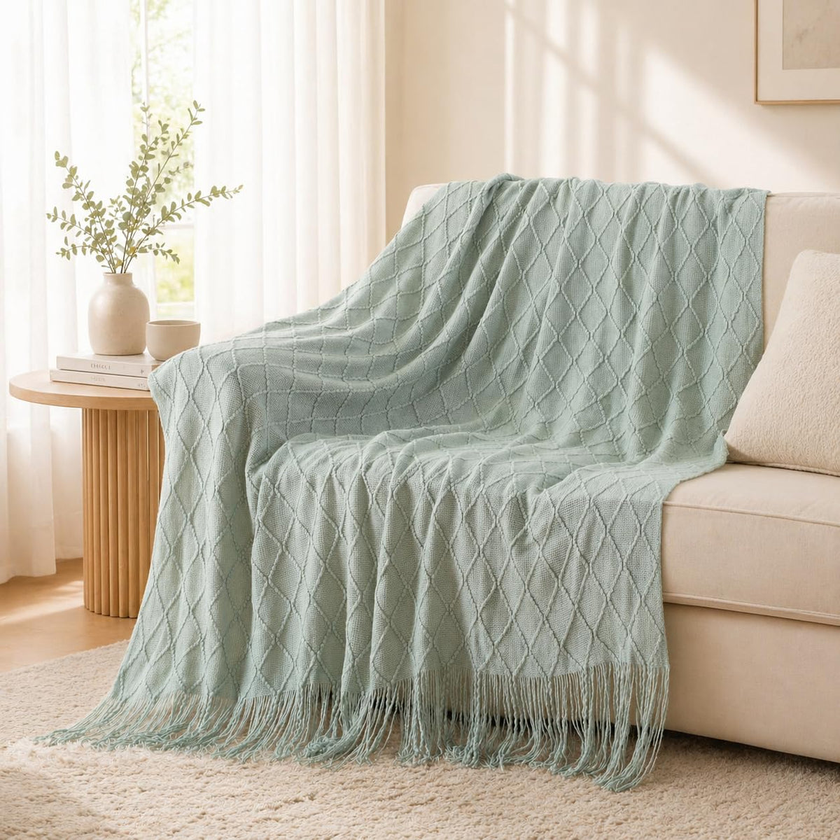 BATTILO HOME Sage Green Throw Blanket rolled fringe detail adds farmhouse charm.