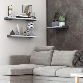 Close-up of BAYKA floating shelves showing paulownia wood and metal brackets for sturdy display.