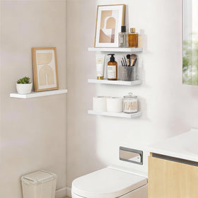 BAYKA four-pack white shelves ready for assembly and wall mounting