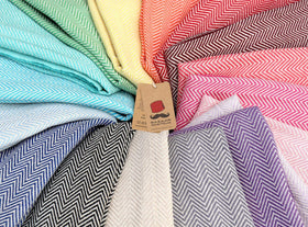 Bazaar Anatolia large 71x39 inch towel for poolside lounging.
